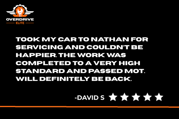 Positive review of Overdrive Elite car servicing with five-star rating on a black background